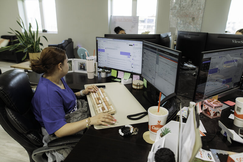 Roll-off dumpster being delivered